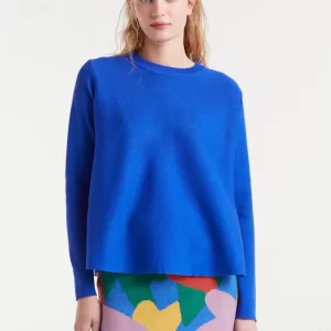 Blue flared knit sweaterBlue flared knit sweater with a round neck and long sleeves.